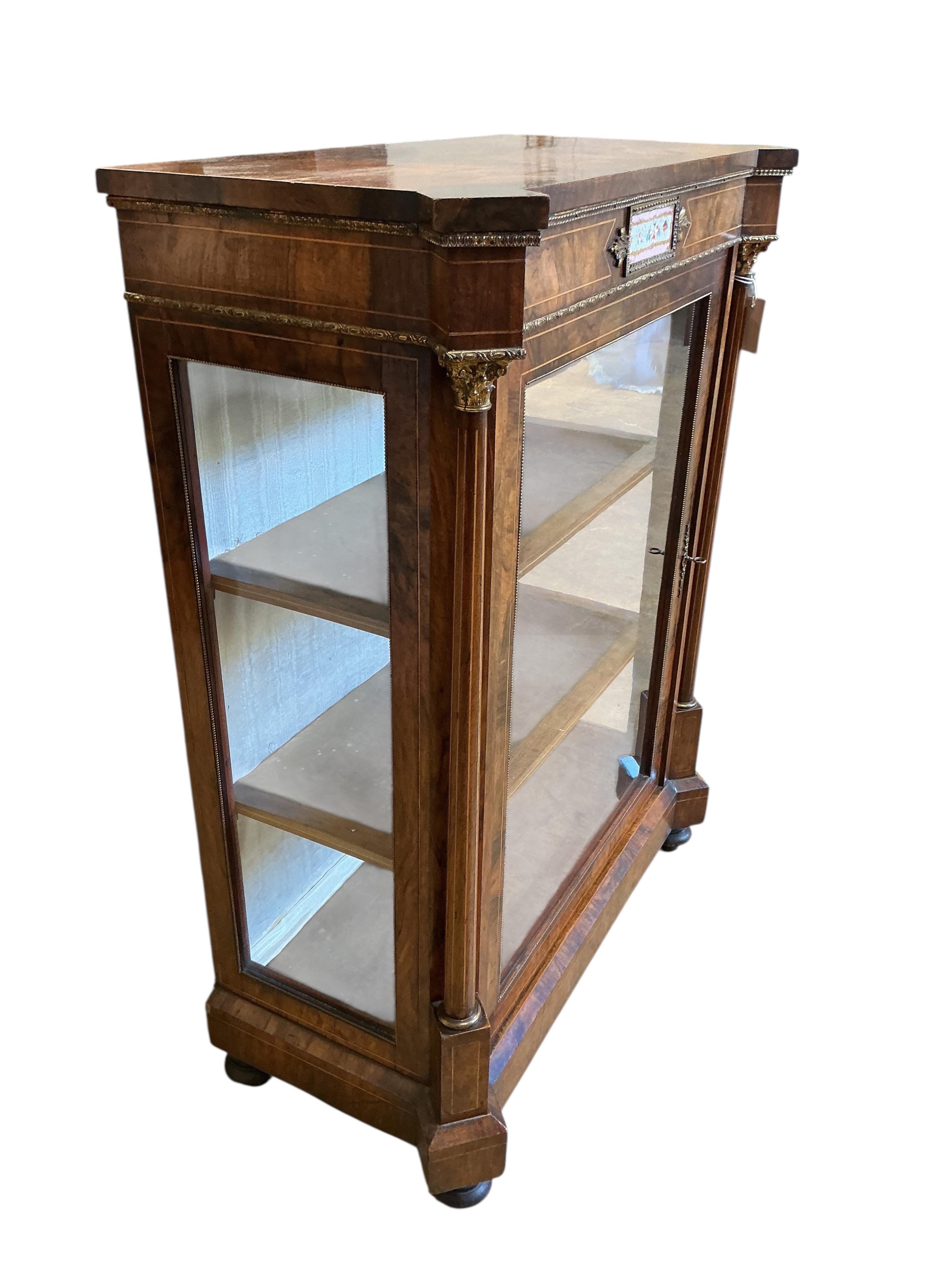 A Victorian walnut and porcelain mounted pier cabinet, width 82cm, depth 40cm, height 108cm